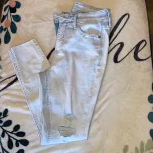 Very Light Blue Jeans with Fringed cuffs